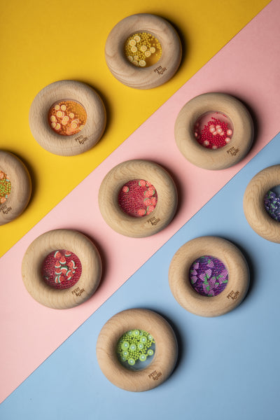 Donuts sensoriels en bois - Petit Boum
