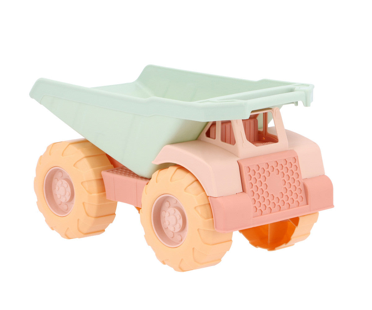 Camion Benne Sand Monnëka avec benne basculante et roues mobiles pour enfants dès 6 mois, idéal pour jouer dans le sable et à la plage.