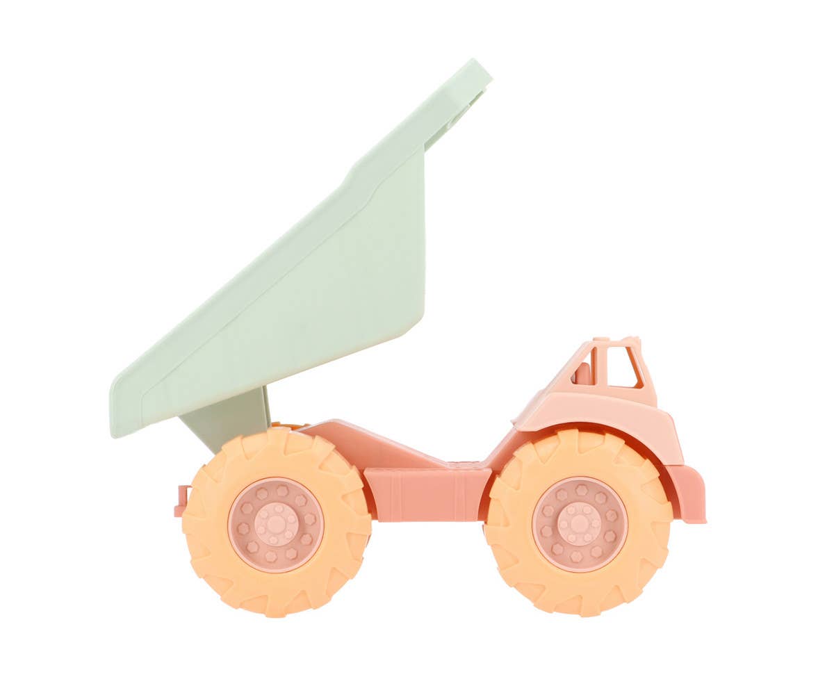 Camion Benne Sand Monnëka avec benne basculante et roues mobiles pour enfants dès 6 mois, idéal pour jouer dans le sable et à la plage.